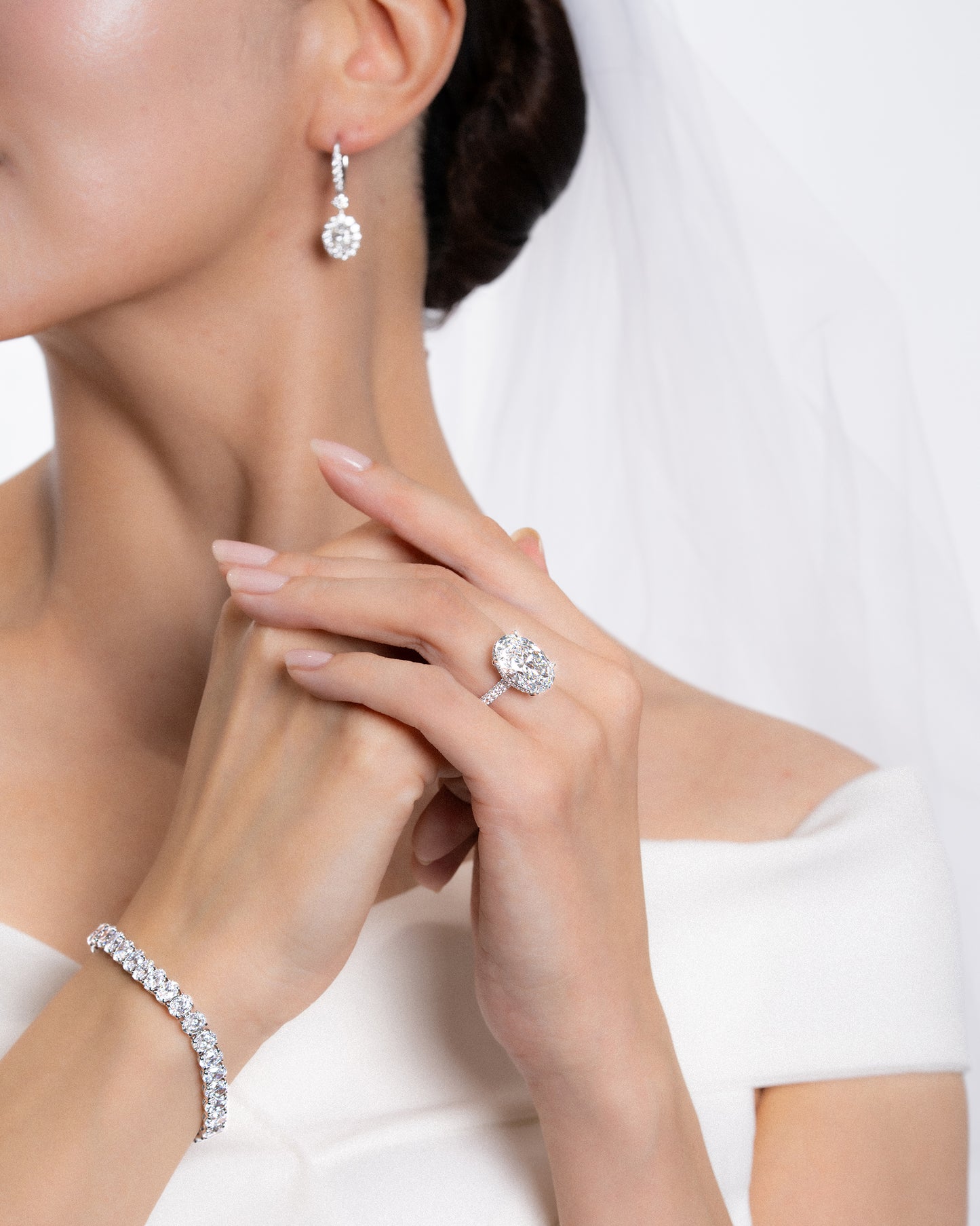 Oval Hidden Halo Ring
