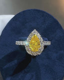 Vivid Yellow Pear Halo Ring